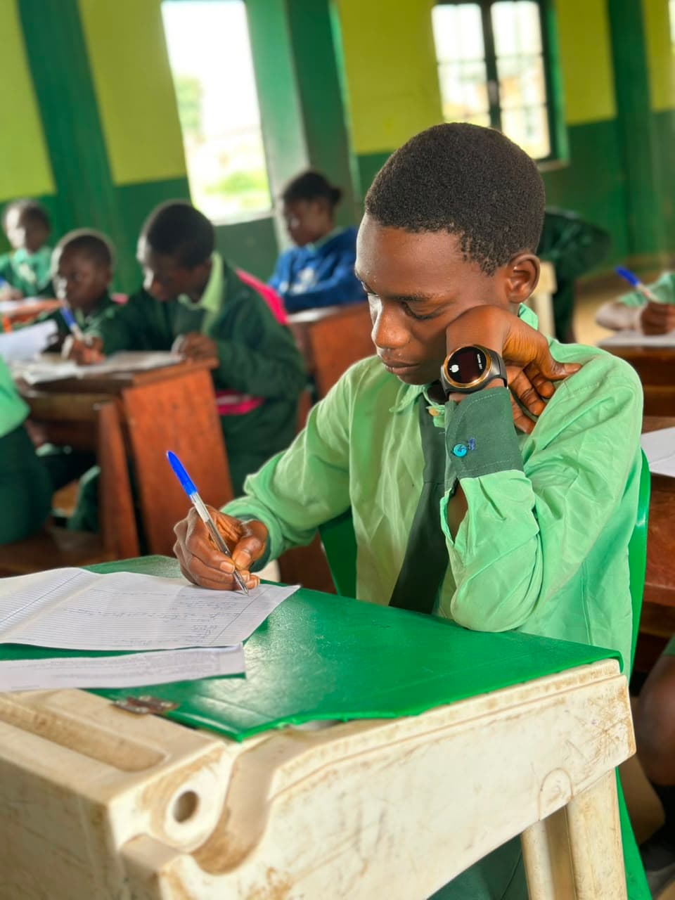 Wide view of students taking an exam