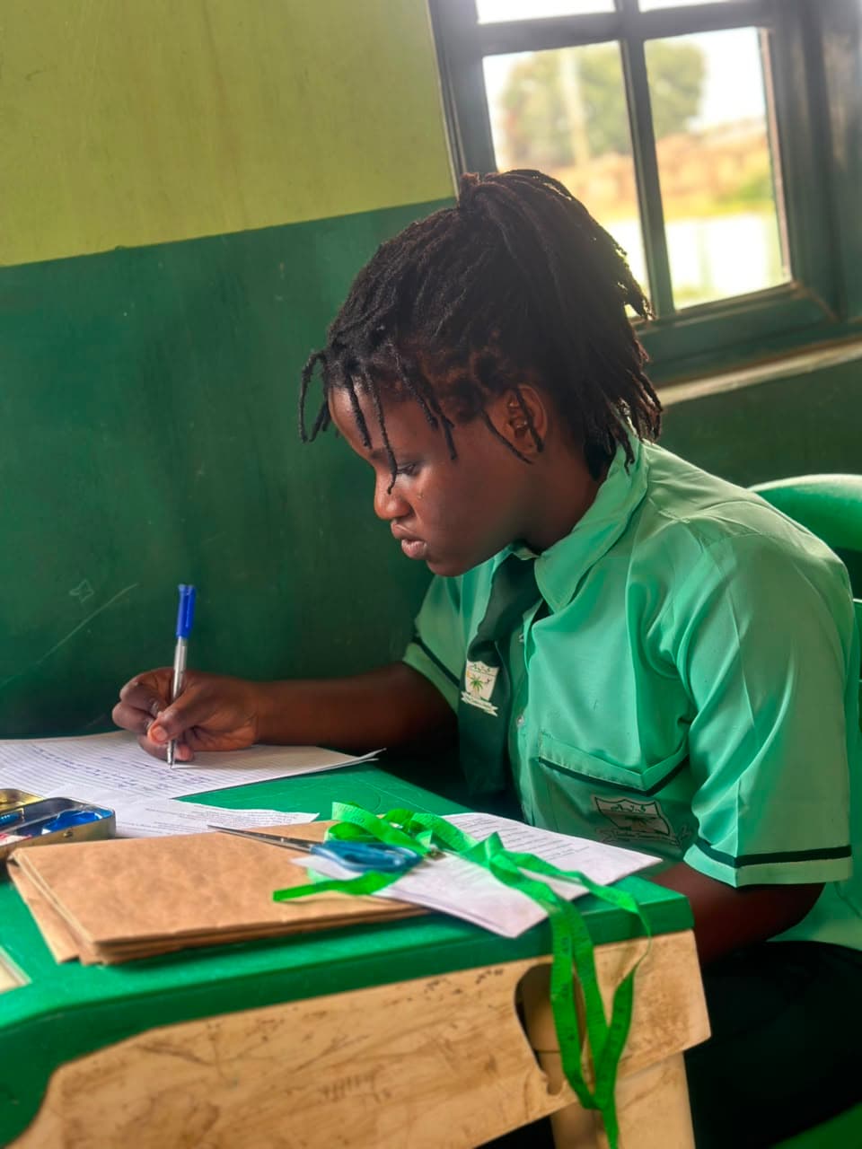 Student engaged in a craft activity